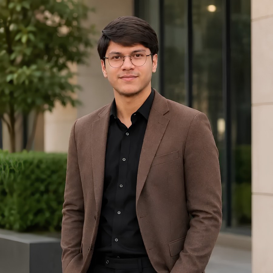Yahya Sarwar, AI engineer and tech entrepreneur, in a brown blazer